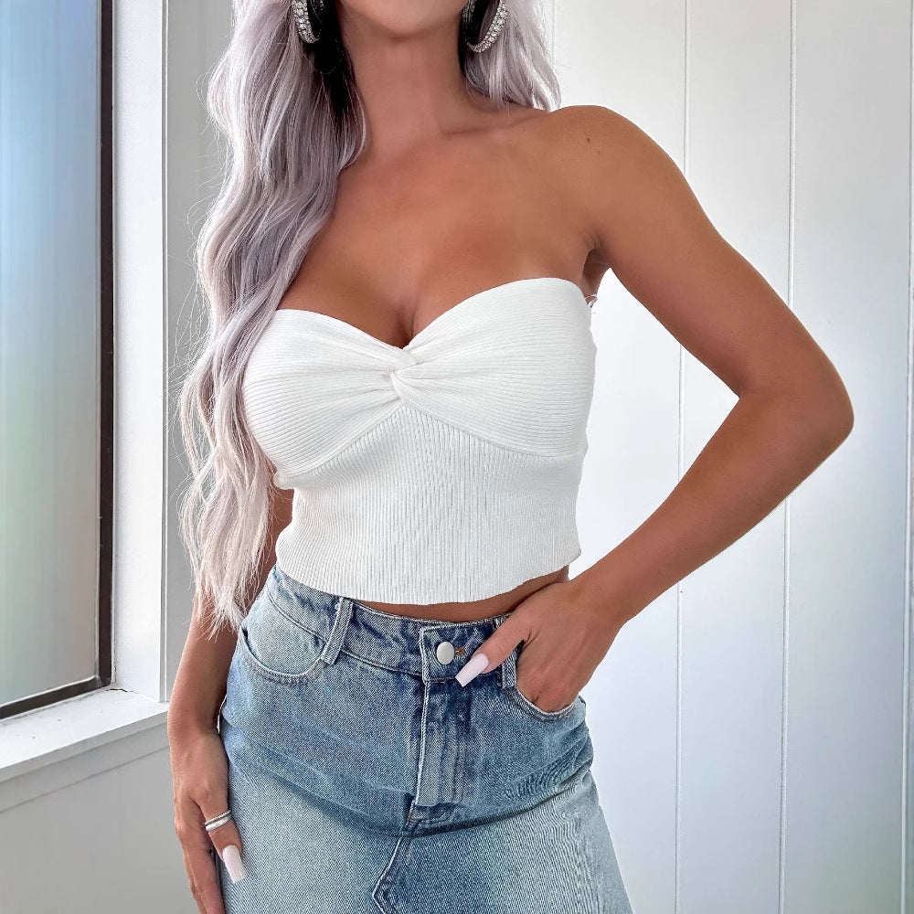 Women's mid-length denim skirt with partially frayed hem and high slit