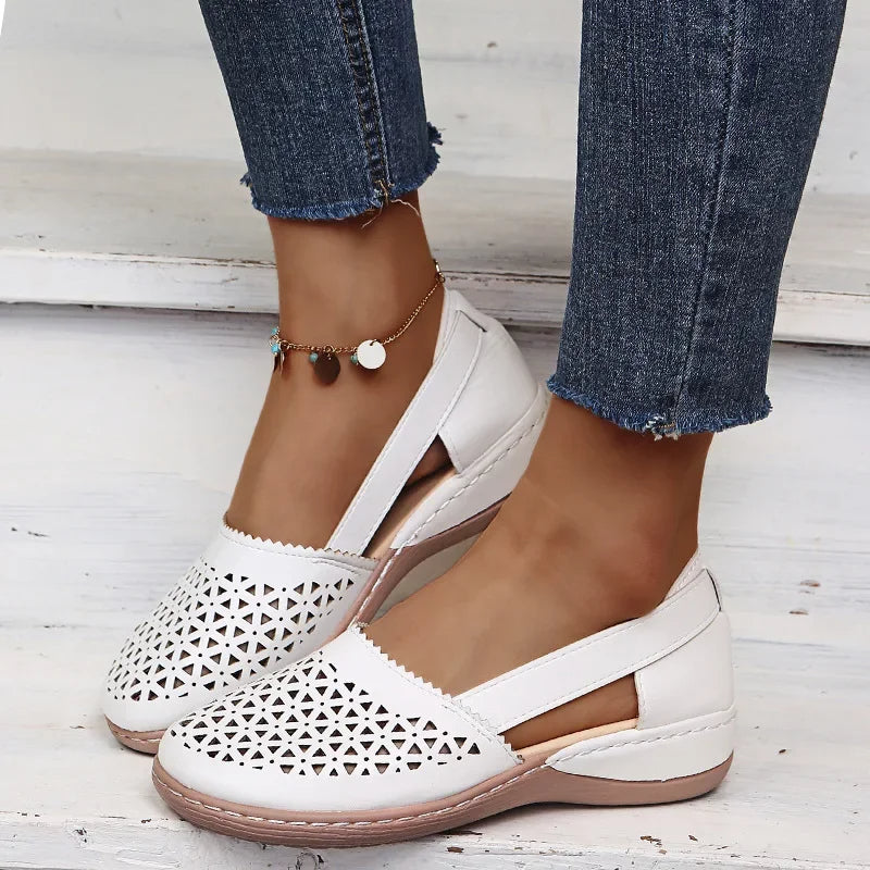 Slip-on wedge sandals.