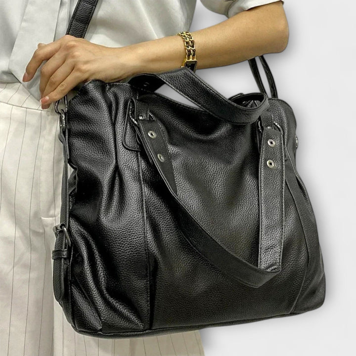 https://cdn.shopify.com/s/files/1/0878/4406/1529/files/Female-Hobo-Handbag-Large-Capacity-Shoulder-Bags-Big-Stylsih-Tote-Bag-Ladies-Soft-Leather-Hobos-Messenger_926c9d46-37b5-49db-b005-34608b4eecef-Photoroom.jpg?v=1771880917