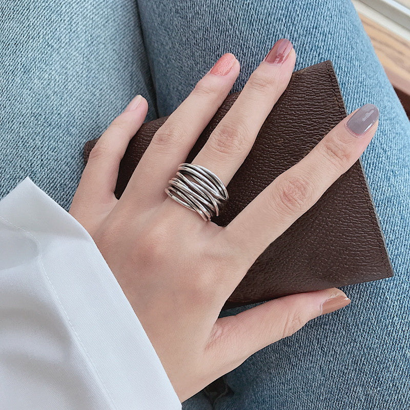 Adjustable layered silver ring