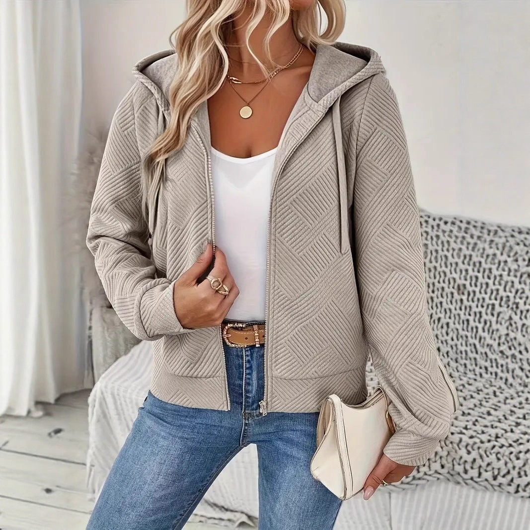 Veste à capuche sportive pour femmes avec design texturé et poches pratiques Chic & Stil