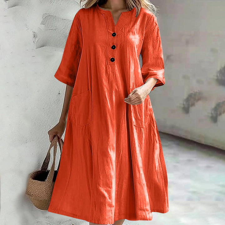 Casual linen dress for ladies with practical pockets and chic button details
