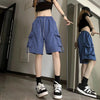 Women's cargo shorts with practical side pockets and elastic waistband