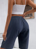 Comfortable women's sports shorts with elastic waistband and practical pocket design