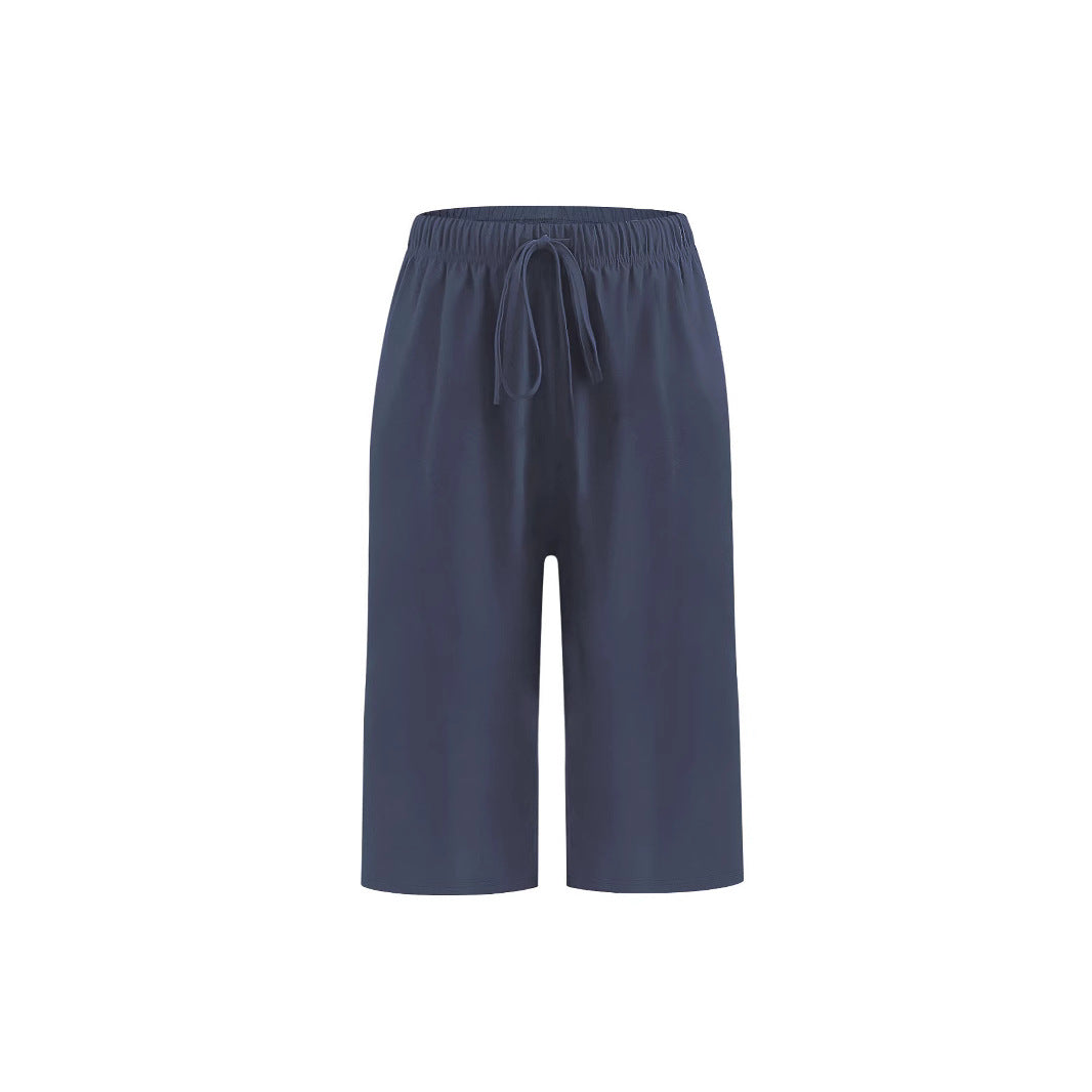 Comfortable women's sports shorts with elastic waistband and practical pocket design Lune London