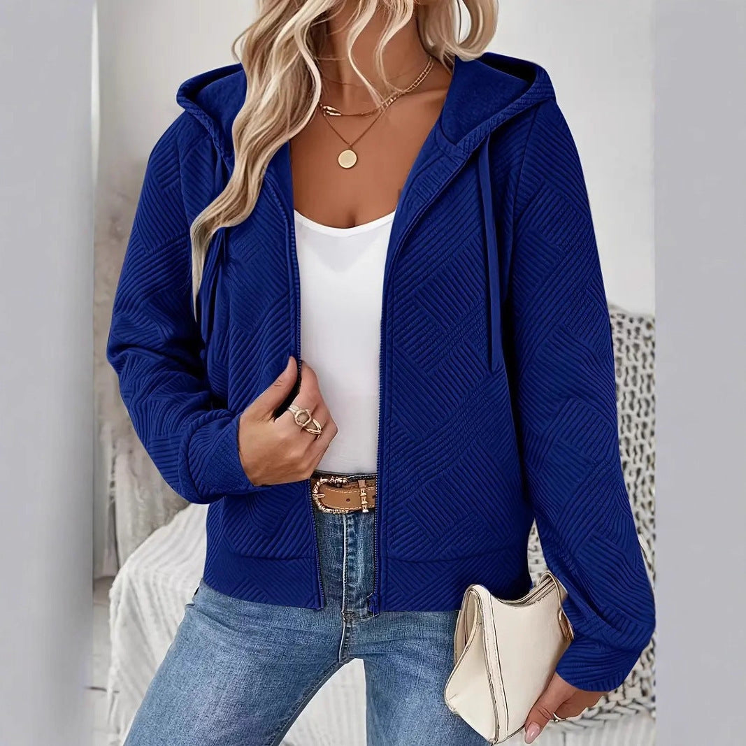 Veste à capuche sportive pour femmes avec design texturé et poches pratiques Chic & Stil