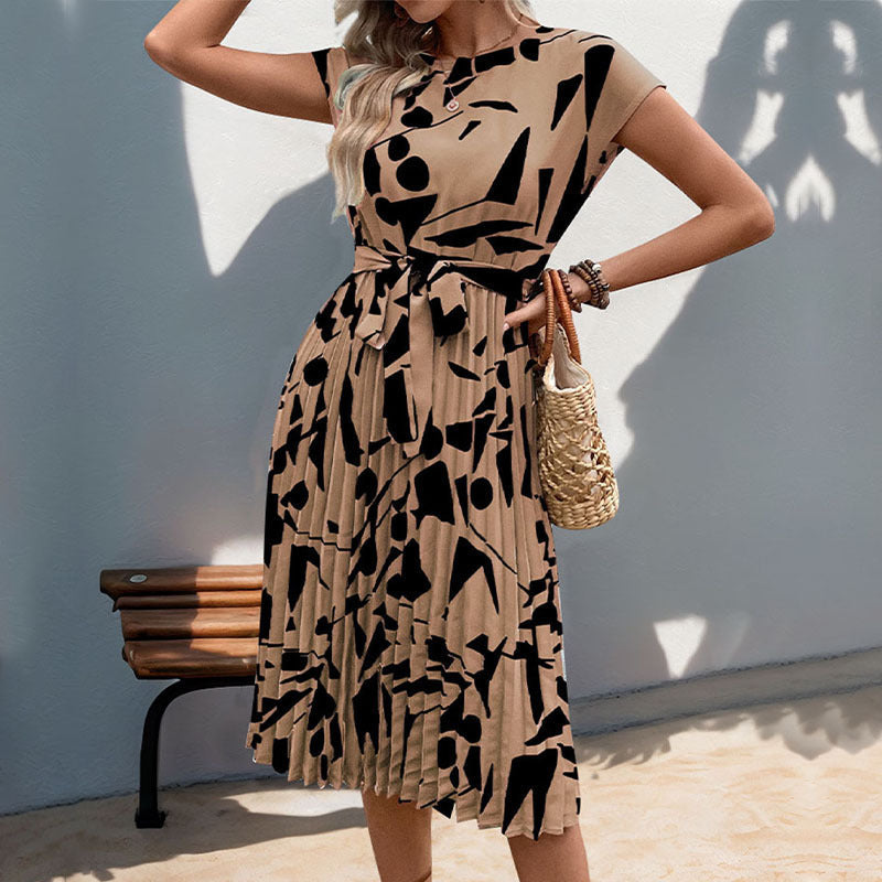 Lune London A-line pleated dress for ladies with abstract print and fitted belt