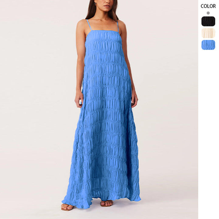 Women's maxi dress with romantic pleated structure and delicate spaghetti straps