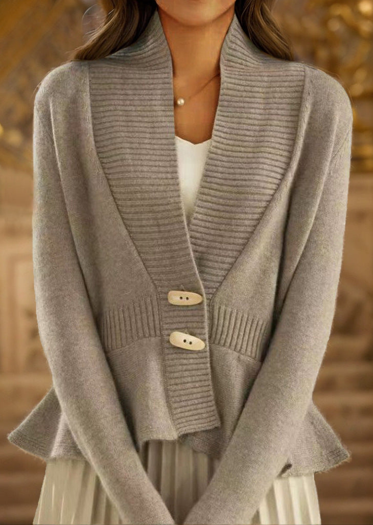 Women's knitted jacket with asymmetrical cut and decorative buttons Chic and Style