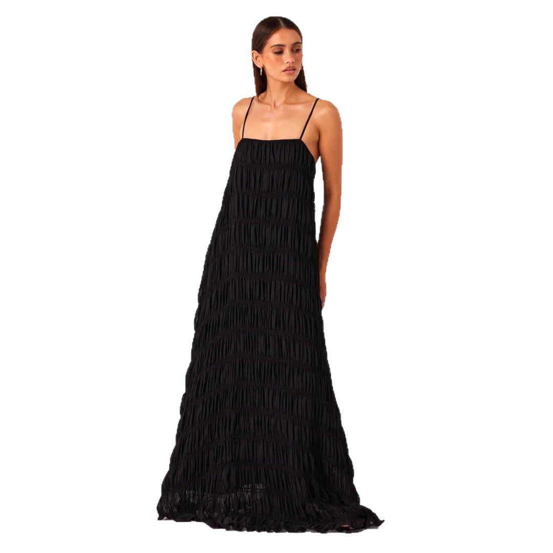 Women's maxi dress with romantic pleated structure and delicate spaghetti straps