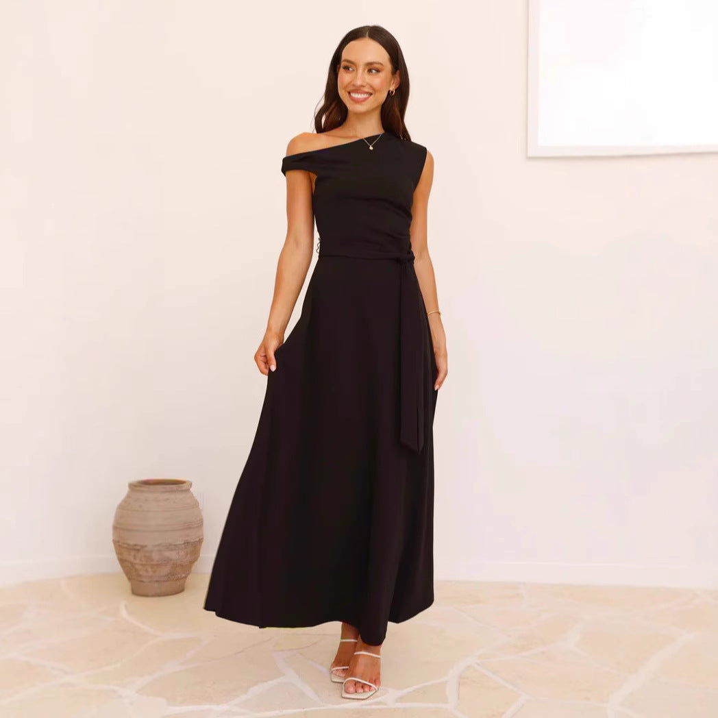 Women's maxi dress with a chic asymmetrical neckline and elegant bow