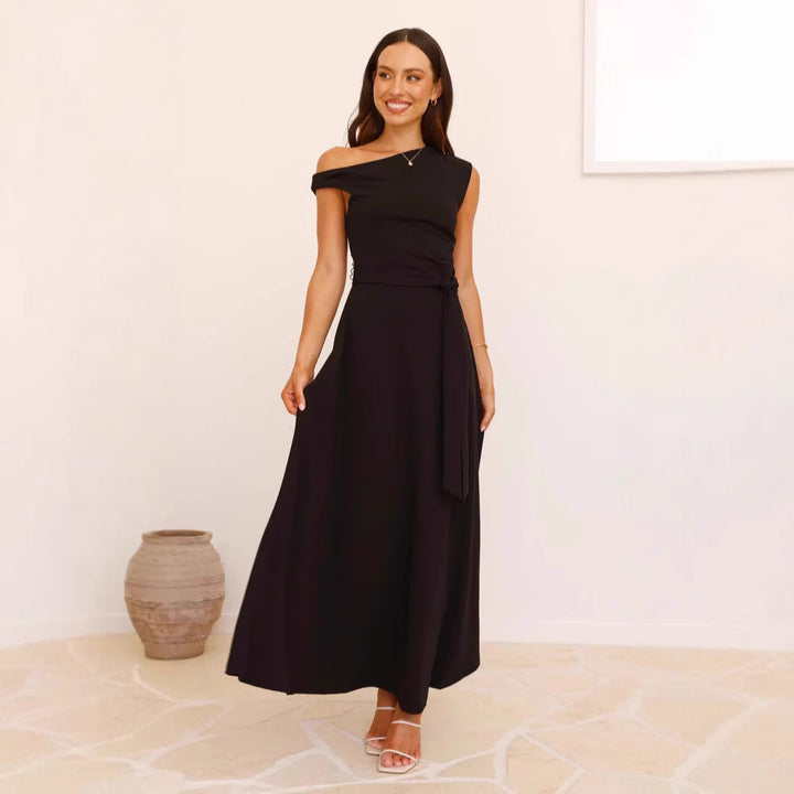 Women's maxi dress with a chic asymmetrical neckline and elegant bow