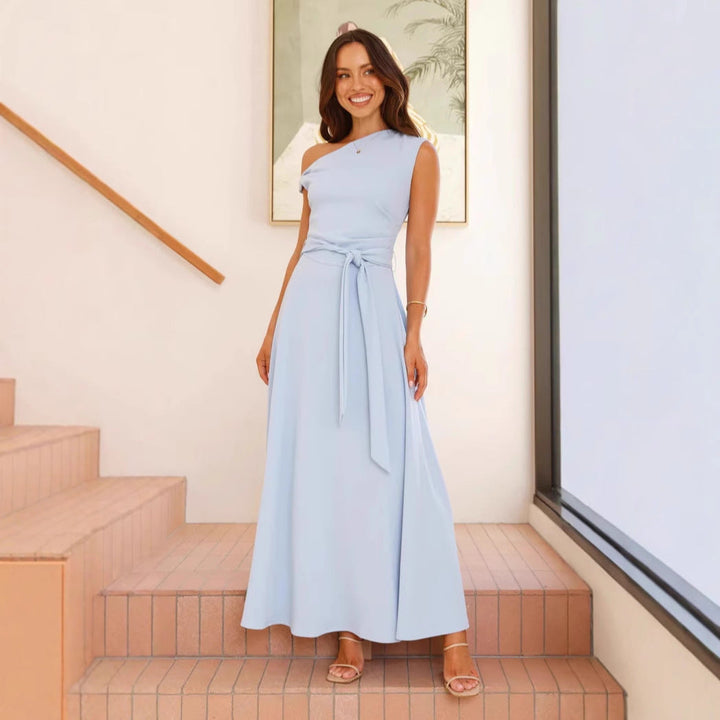 Women's maxi dress with a chic asymmetrical neckline and elegant bow