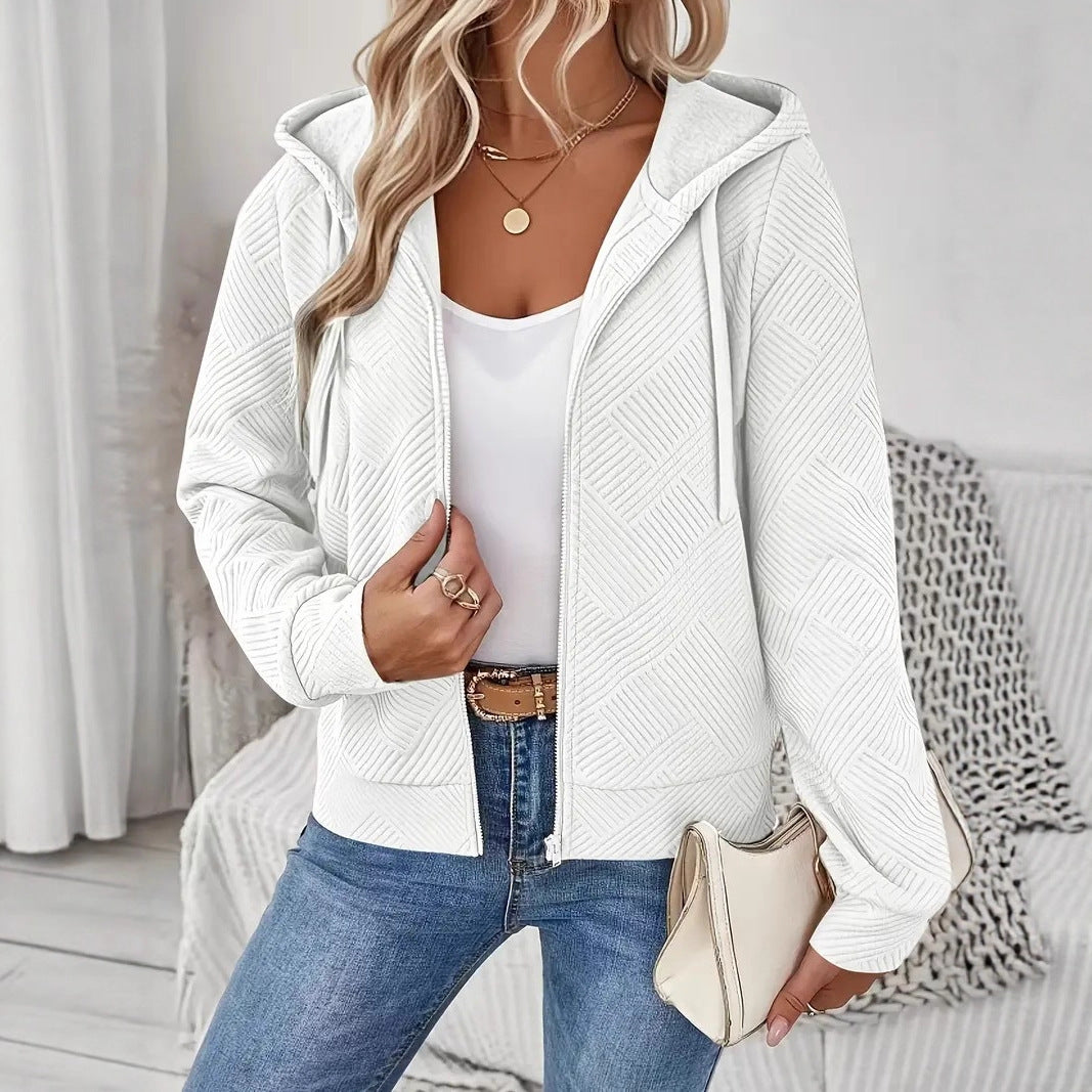 Veste à capuche sportive pour femmes avec design texturé et poches pratiques Chic & Stil
