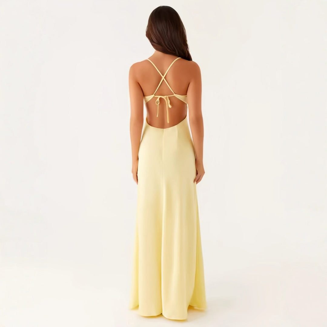 Women's evening dress with seductive spaghetti strap design and elegant slit