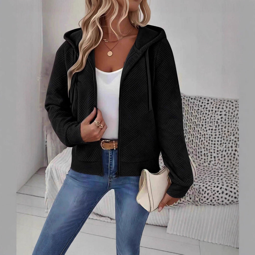 Veste à capuche sportive pour femmes avec design texturé et poches pratiques Chic & Stil