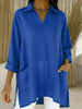 Women's long sleeve blouse with elegant V-neckline and practical pockets