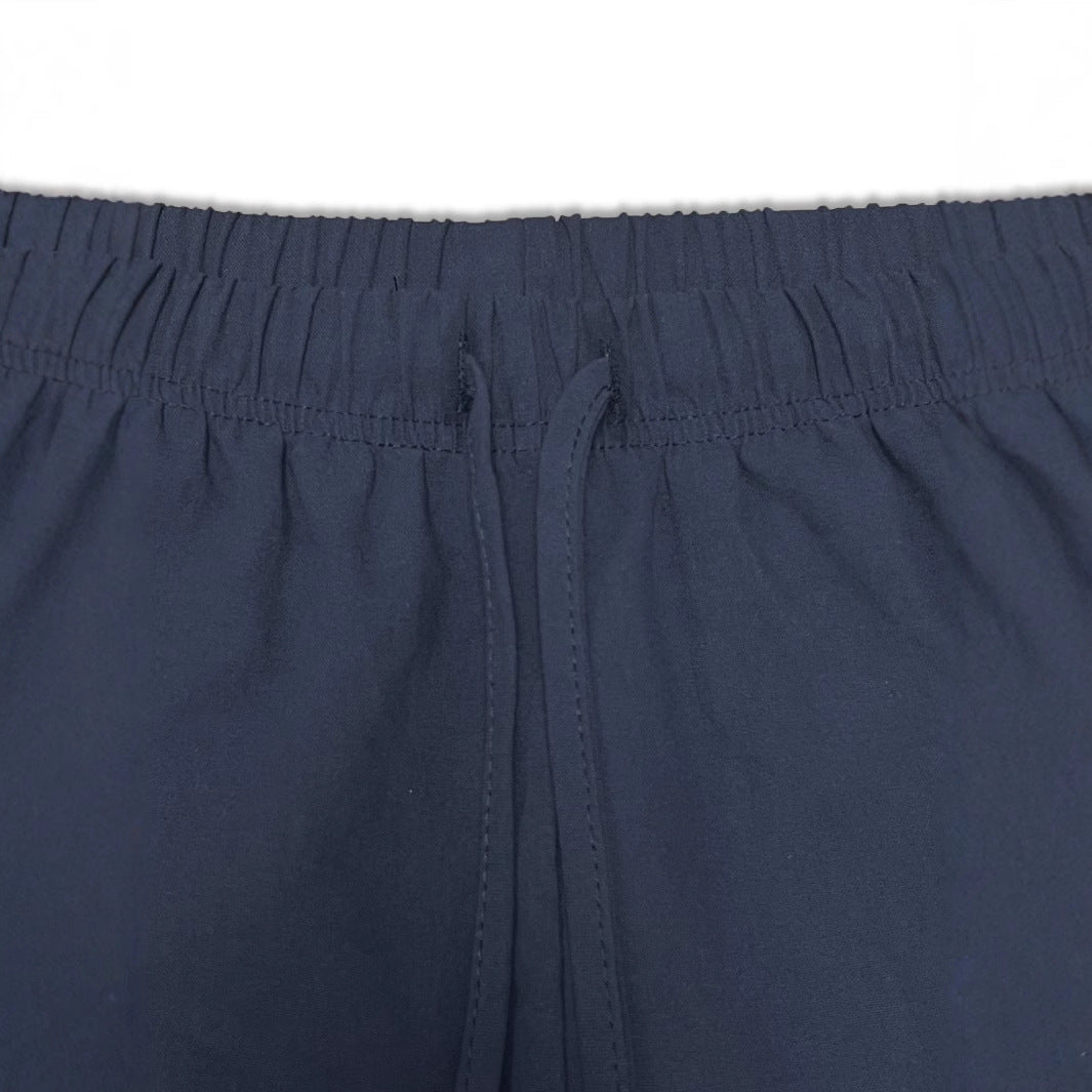 Comfortable women's sports shorts with elastic waistband and practical pocket design Lune London