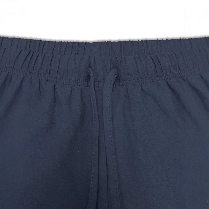 Comfortable women's sports shorts with elastic waistband and practical pocket design Lune London