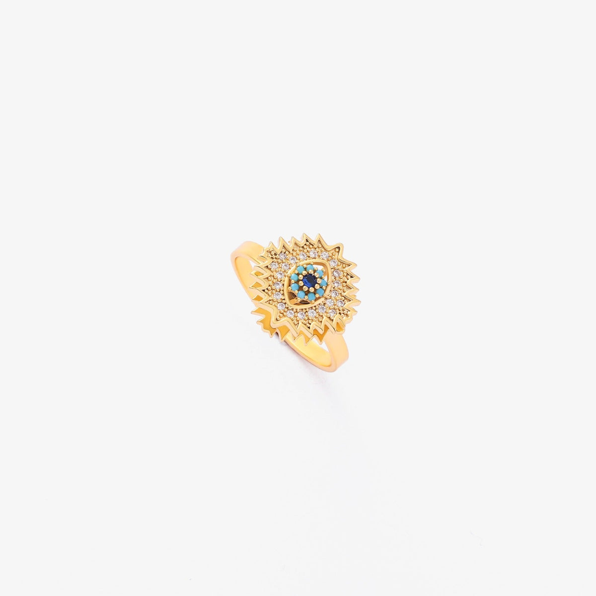 Gold twist ring with sapphire and sunburst design