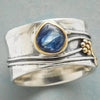 Meditation ring with rotating element