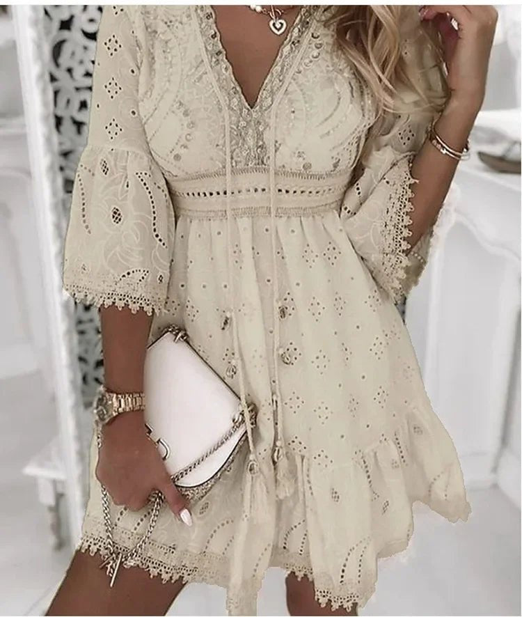 https://cdn.shopify.com/s/files/1/0943/0581/2804/files/boho-mini-dress-v-neck-lace-bell-sleeves-a-line-3.jpg?v=1778140582