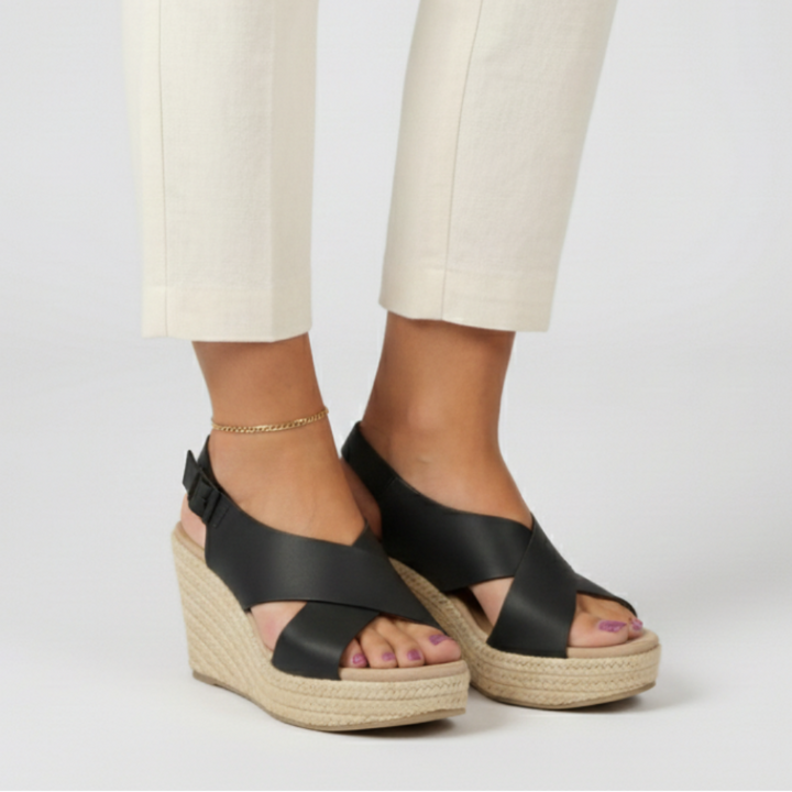 https://cdn.shopify.com/s/files/1/0878/4406/1529/files/comfortable-orthopedic-wedge-espadrilles-clara-black-4-state_of_style-6_6.png?v=1777503889