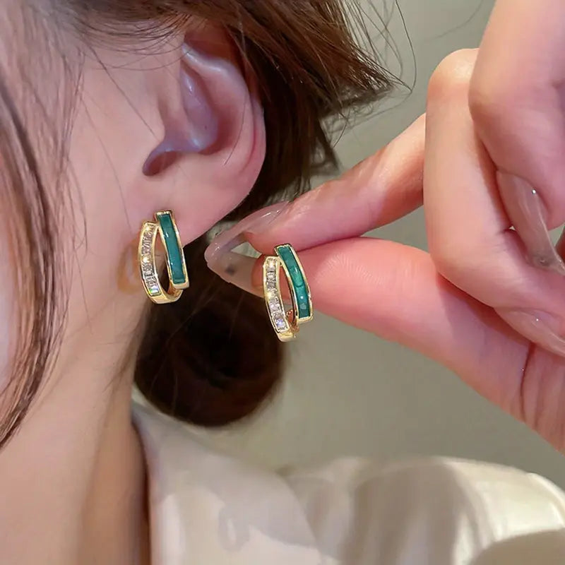 Elegant gold earrings with leaves