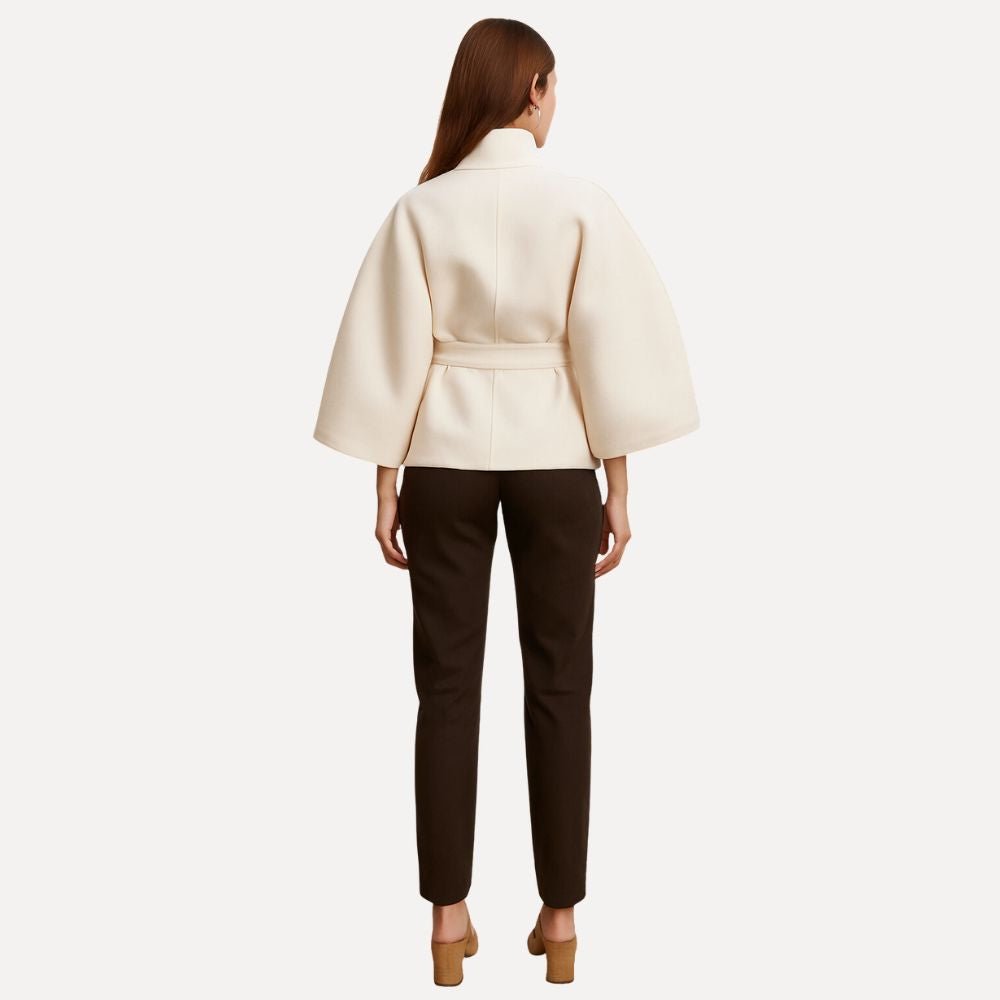 https://cdn.shopify.com/s/files/1/0876/2487/6380/files/kouvr-jannah-white-wool-cape-jacket-back1.jpg?v=1772395323