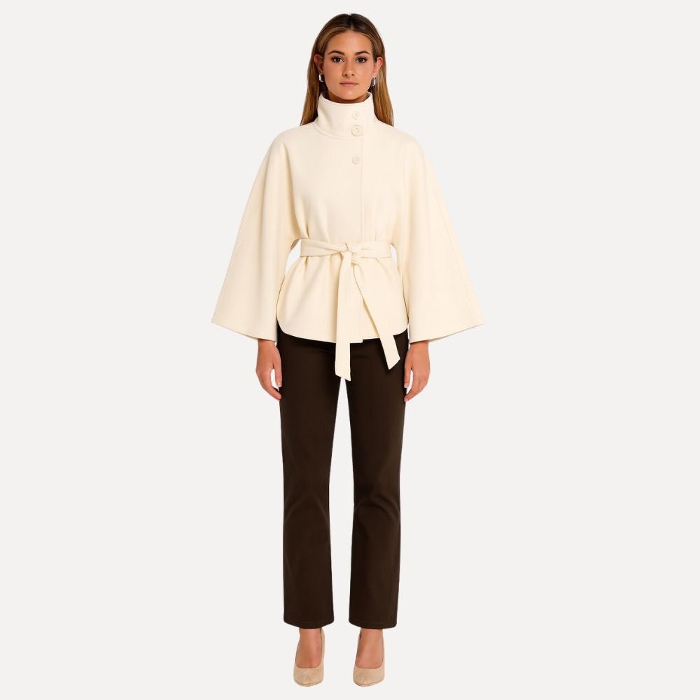 https://cdn.shopify.com/s/files/1/0876/2487/6380/files/kouvr-jannah-white-wool-cape-jacket-front.jpg?v=1772395323
