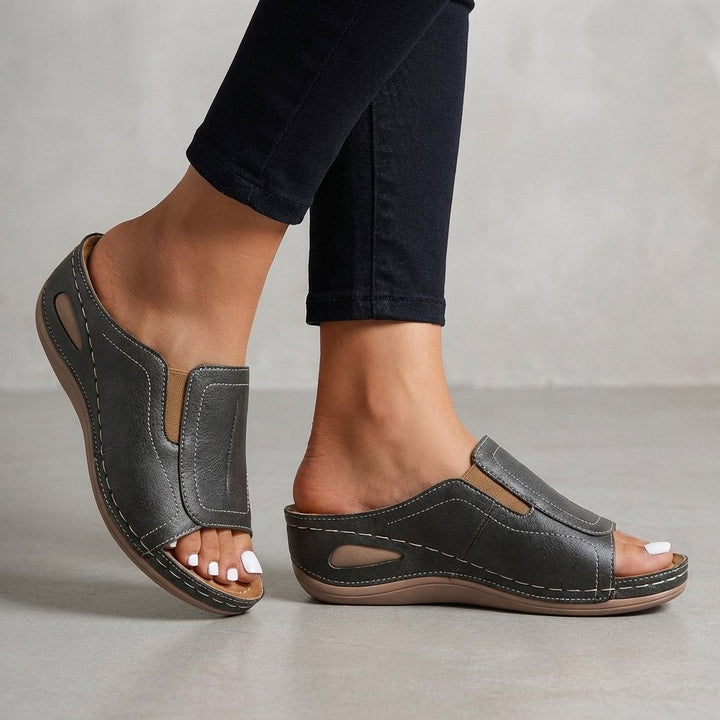 https://cdn.shopify.com/s/files/1/0943/0581/2804/files/orthopedic-wedge-sandals-slip-on-leather-open-toe-1.jpg?v=1777200043