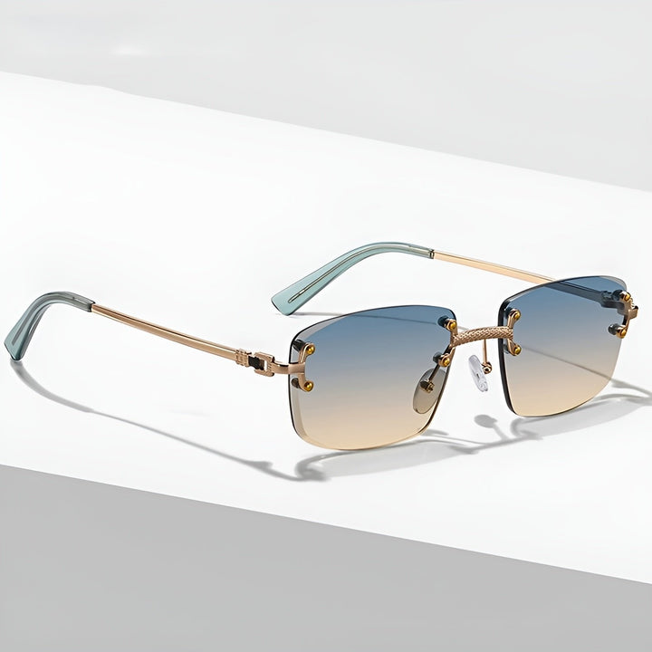 https://cdn.shopify.com/s/files/1/0943/0581/2804/files/sunglasses-rimless-gradient-lenses-uv400-protection-gold-1.jpg?v=1777615446