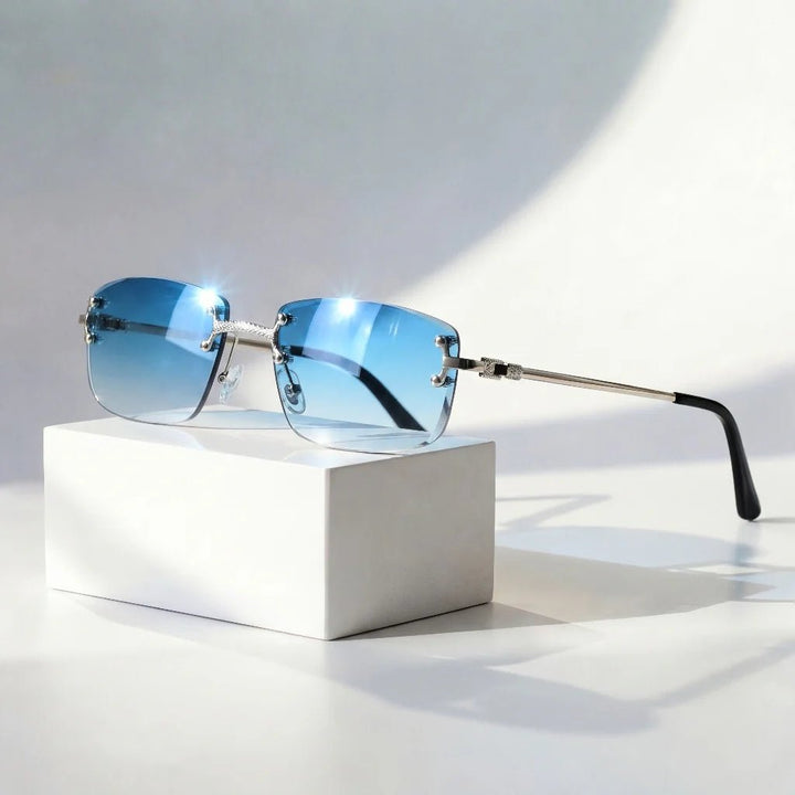 https://cdn.shopify.com/s/files/1/0943/0581/2804/files/sunglasses-rimless-gradient-lenses-uv400-protection-gold-3.jpg?v=1777615446