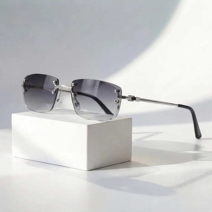 https://cdn.shopify.com/s/files/1/0943/0581/2804/files/sunglasses-rimless-gradient-lenses-uv400-protection-gold-4.jpg?v=1777615446