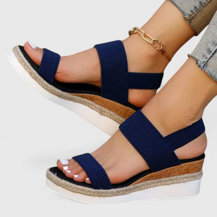 https://cdn.shopify.com/s/files/1/0878/4406/1529/files/z4OkSandali-con-zeppa-lavorati-a-maglia-in-tessuto-elasticizzato-sandali-con-plateau-con-fascia-elastica-posteriore_720x-Photoroom.jpg?v=1776769781